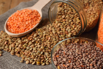 Different lentils on linen sackcloth
