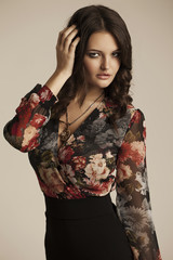 Portrait of a passionate  Spanish girl in a bright dress.