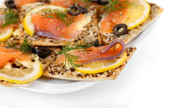 Salmon sandwiches on plate  isolated on white