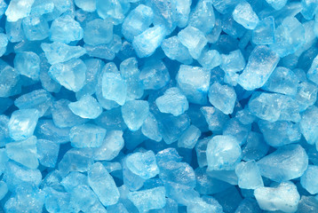 blue crystal bath salt on white background