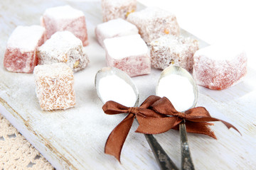 Tasty oriental sweets (Turkish delight) with powdered sugar,