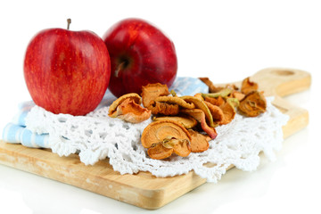 Dried apples and fresh apples,on cutting board isolated on