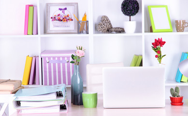 Workplace with laptop, close up