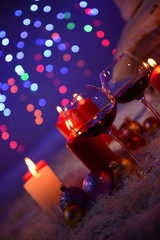 Composition with plaids, candles and Christmas decorations,