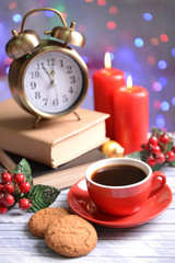 Composition of book with cup of coffee and Christmas