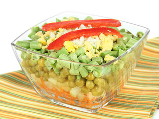 Tasty salad with fresh vegetables, isolated on white