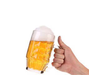 Big mug with gold beer.