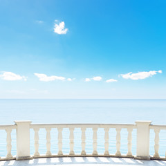 white balcony on terrace near sea and blue sky