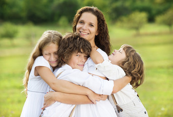 Children and mother hugging