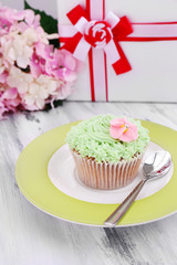 Tasty cupcake with butter cream,