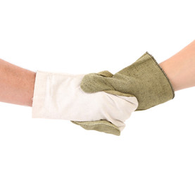 Two hands mittens in hand shake.