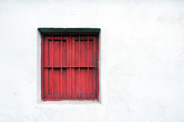 window guard on a old wall house facade
