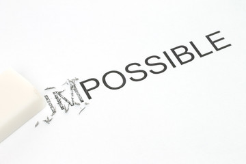 Eraser with erased part of the impossible word close-up.