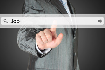 Businessman pushing virtual search bar with job word 