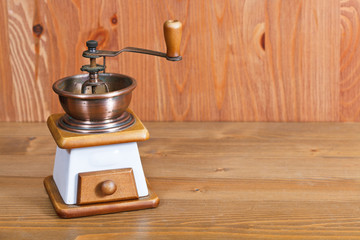 coffee mill on wooden table