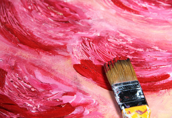 Paintbrush and beautiful painting with flowers