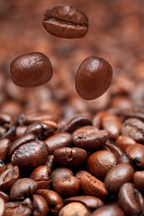 falling beans and dark roasted coffee