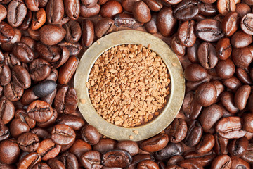 instant coffee and roasted beans close up
