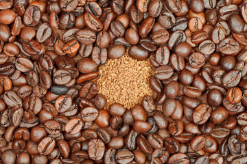 instant coffee and roasted beans close up