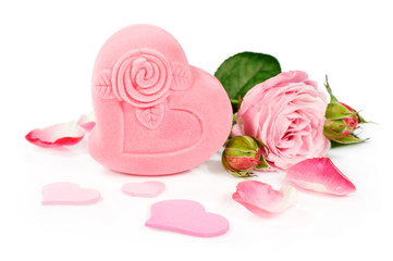 pink gift box with a rose and petals
