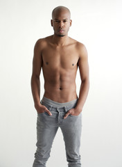Fototapeta premium Handsome black male fashion model shirtless