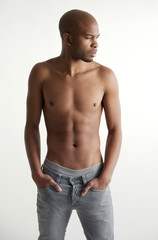 Fototapeta premium Good looking young man standing on white background