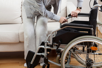 Obraz premium Sitting down on wheelchair