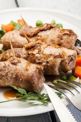 Pork rolls and vegetables