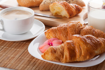 French croissants with a cup of coffee