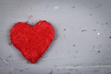 Red string heart, closeup view