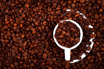 Cup with coffe beans