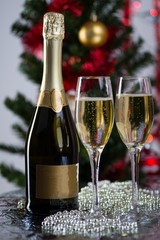 glasses for champagne and bottle