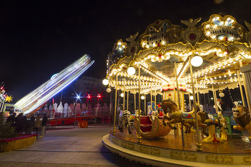 Luna park carousel in a public outdoor area