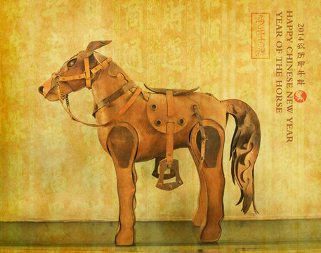 Leather horse souvenir on old paper