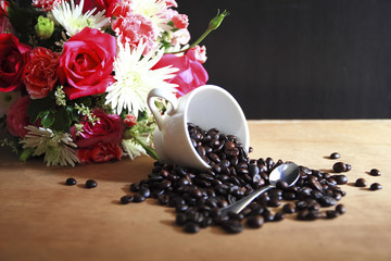 Coffee beans and cup of coffee background 