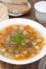 vegetable soup with meatballs, close-up