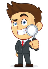 Businessman Holding a Magnifying Glass