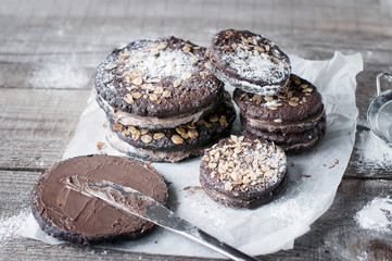 Oatmeal  chocolate cookies on wooden board