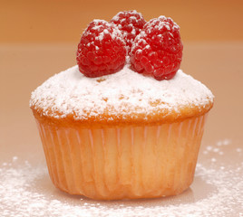 Cupcake with raspberries