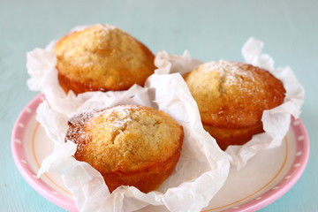 fresh baked healthy homemade muffins on vintage plate