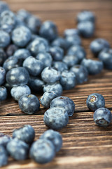 blueberries on old wooden table