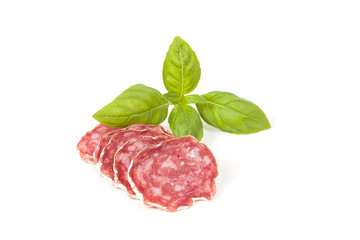 Salami sliced on the white background