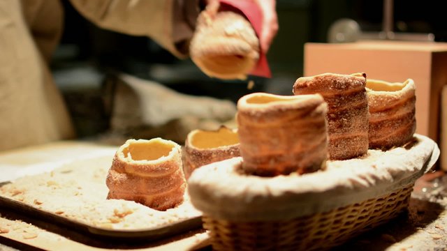 Trdeln&iacute;k (chimney cake or stove cake) in shop (in night)
