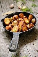 Roasted potato in a frying pan