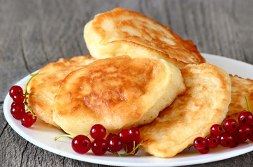 Pancakes on wooden table