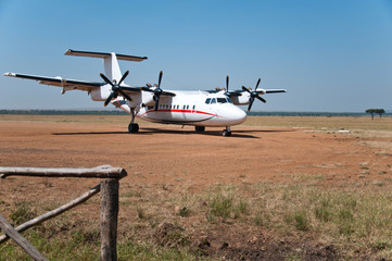 parked airplane in the national park masai mara in kenya