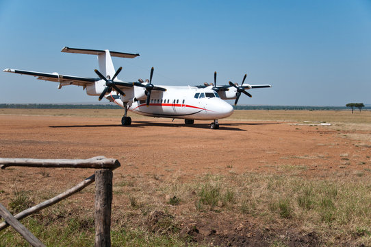 parked airplane in the national park masai mara in kenya