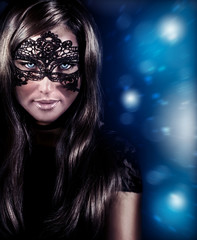 Fototapeta premium Beautiful woman wearing mask