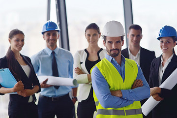 business people and construction engineers on meeting