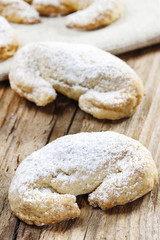 Christmas croissants on wooden table